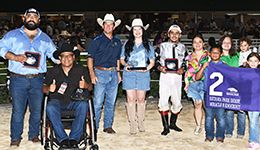 The winning connections of Miracle B Knockout accept the $216,650 Retama Park Derby [G3] trophy at the Retama Park on Saturday.