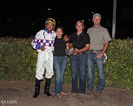 Winning connections of Famous N Relentless accept the $100,000 Ruidoso Invitational Stakes trophy at The Downs at Albuquerque on Saturday.