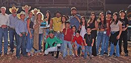 The winning connections of Corona Relentless accept the Rockey Heinzig Stakes trophy Saturday night at Fair Meadows.