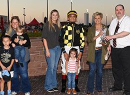 The winning connections of Jess Want To Know accept the Valley Junction Juvenile Stakes trophy.