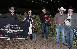 The winning connections of Shakers No Secret accept the AQHA Challenge Championship(G1)  trophy at The Downs at Albuquerque on Saturday.