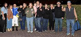 The winning connections of Jo Nita Foose Around accept the Albuquerque Juvenile Stakes trophy at Albuquerque Downs on Saturday.