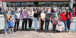 The winning connections of Da Edge Of Gray accept the $70,000 Jimmy Drake Stakes trophy at SunRay Park on Friday.