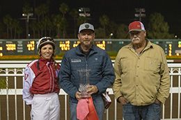 The winning connections of Shaken Goin On accept the $40,000 Miss Princess Handicap (G2) trophy at Los Alamitos on Sunday.