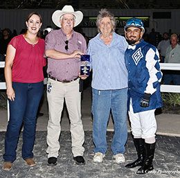 The winning connections of Determined accept the Sam Houston 550 Stakes trophy on Saturday; Jack Coady Photography