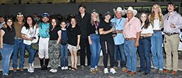 The winning connections of Ladys Gotta Jet accept the Miss Sam Houston Stakes trophy on Saturday at Sam Houston Race Park