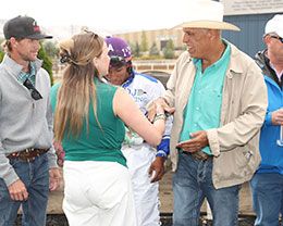 The winning connections of Ojd Jess A Bug celebrate in the Sweetwater Downs winner's circle Sunday afternoon.