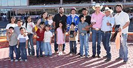 The winning connections of Lovely Josie James accept the $80,000 Sunburst Stakes (G3) trophy at Sunland Park on Saturday.