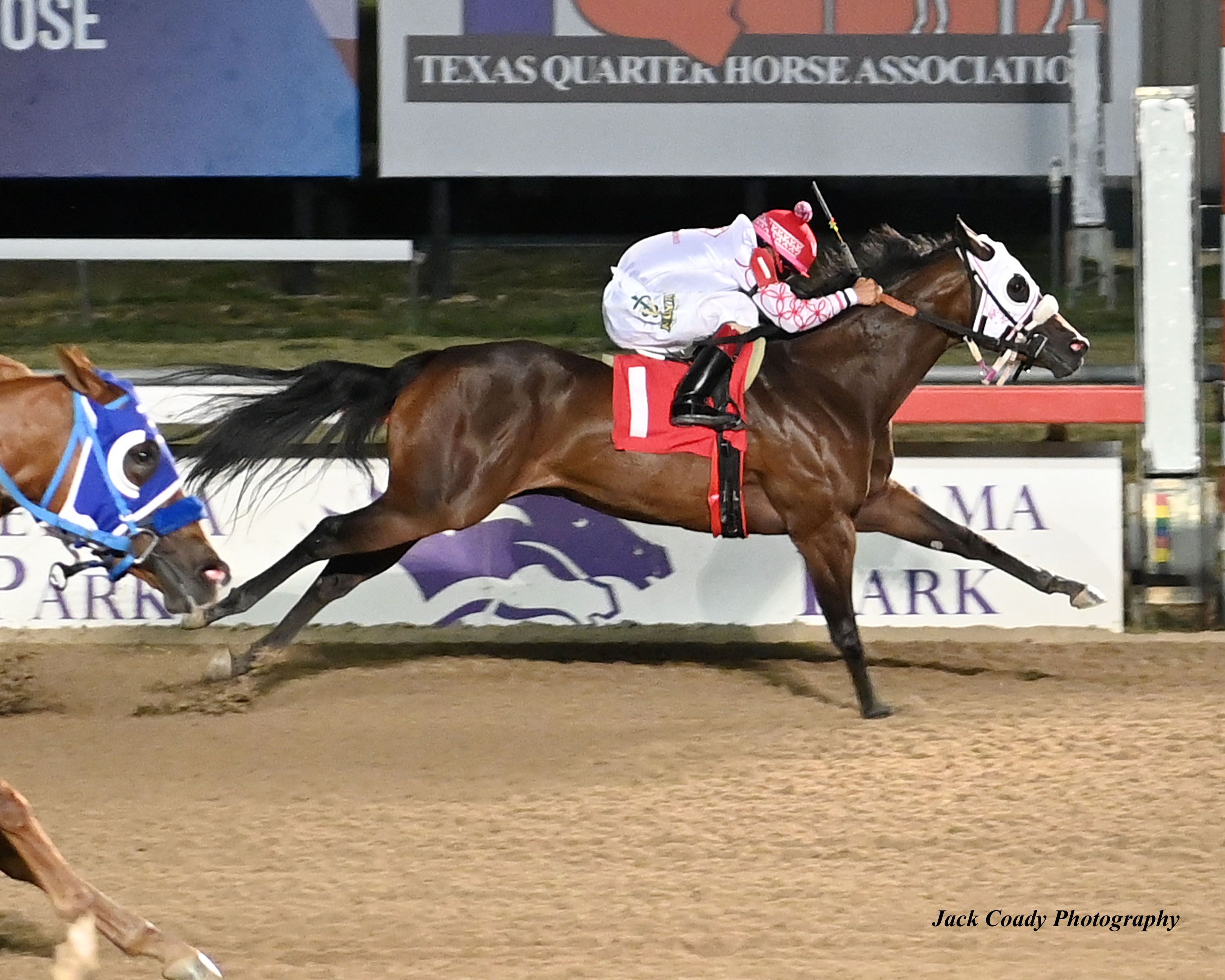 Shes Ec To Tempt, under jockey Victor Manuel Urieta Jr., won the $100,000 TQHA Sires' Cup Derby (RG3) 