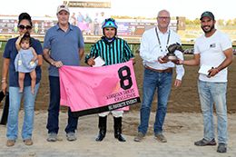 The winning connections of HG Favorite Energy accept the $37,774 Adequan Derby Challenge trophy at Horseshoe Indianapolis on Thursday.