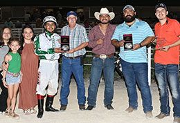 The winning connections of Machiavelli accept the TQHA Sires' Cup Futurity stakes trophy.