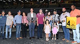 The winning connections of Dk Marney Jess accept the Sam Houston Futurity Stakes trophy.