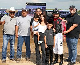 The winning connections of Ap Political Patriot accept the $212,170 QHRAI Stallion Service Auction (SSA) Futurity [RG3] trophy at Horseshoe Indianapolis on Saturday.
