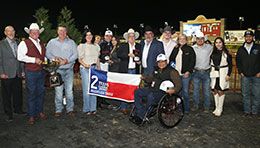 The winning connections of Relentless Eagle accept the Texas Classic Derby stakes trophy at Lone Star Park.