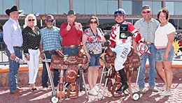 The connections of Kj Flying Cowgirl accept the $101,990 West Texas Maturity trophy at Sunland Park on Sunday.