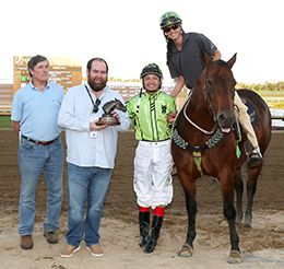 The winning connections of TW Streakin Cowboy accept the John Deere Juvenile Challenge trophy at Horseshoe Indianapolis on Tuesday.
