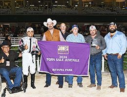 The winning connections of Draco accept the TQHA Sale Juvenile Stakes trophy.