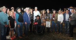 The winning connections of Just Dulce accept the Texas Classic Derby stakes trophy at Lone Star Park Saturday night.