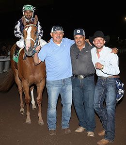 An excited Political Twist team after winning the Rainbow Derby Saturday night.