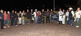 The winning connections of RLH Fouronthefloor accept the Casino at the Downs Stakes trophy at Albuquerque Downs Saturday night.