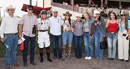 The winning connections of King Dynasty accept the New Mexico State Fair Juvenile trophy at Albuquerque Downs on Sunday.
