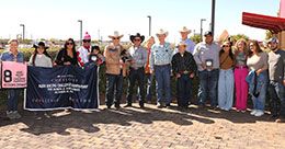 Ten-time AQHA Racing Champion Jockey G.R. Carter, Jr. presents the AQHA Challenge Championship trophy to Ed McNelis and the winning connections of Scoops Dynasty at Albuquerque Downs Sunday.