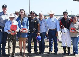 The winning connections of R Dash Of Fire accept the Wyoming Bred QH Futurity stakes trophy and buckles at Energy Downs 307 Horse Racing on Saturday.