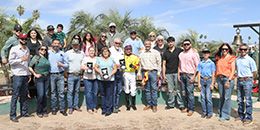 The winning connections of ZM Jess accept the $57,640 AQRA Derby trophy at Turf Paradise on Saturday.