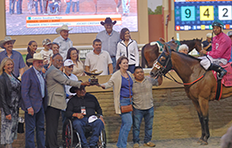 The winning connections of Catchn Southern Rays accept the Junos Reward Stakes trophy on Saturday at Remington Park.
