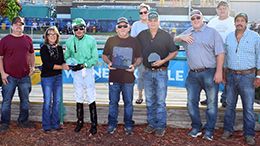 The winning connections of Showin You Some Kvn accept the APHA 79 & Under Speed Index Stakes trophy at Fair Meadows on Saturday.