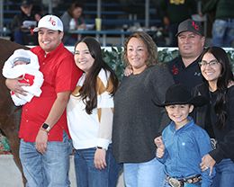 The winning connections of Drest For Success accept the $229,210 New Mexico Classic Derby [G2] trophy at Zia Park on Sunday.