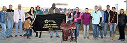The winning connections of Cowboy On The Fly accept the $269,900 Governors Stake trophy at Horseshoe Indianapolis on Saturday.