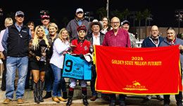 Dunn Ranch is joined in the Goden State Million Futurity winner's circle at Los Alamitos Race Course.