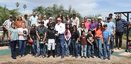 The winning connections of AV Hesadashair accept the $32,800 Mark T Bars Stakes trophy at Turf Paradise on Saturday.