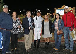 The winning connections of Flyin Chilitos accept the Texas Hero Futurity Stakes trophy at Lone Star Park.