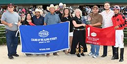 The winning connections of Jackson Davis 747 accept the Colors of the Alamo P&A Futurity trophy at Retama Park on Saturday.
