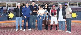 JM Famous Wynn’s connections accept the trophy for the $80,000 Lou Wooten and Sydney Valentini Stakes (RG2)