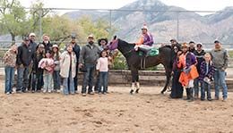 The winning connections of Kr Cartels Calamity accept the Beehive Futurity stakes trophy at Weber Downs.