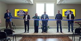 Ribbon Cutting: (From left) Mike Speedy, Secretary of Business Affairs, Mickey Sajche, Chaplain for Indiana HBPA and QHRAI, Jessica Barnes, Assistant Executive Director for the IHRC, Eric Halstrom, Vice President and General Manager of Racing, Chris Duke, President of QHRAI, and Joe Davis, President of Indiana HBPA. Photo by Eve Granitz