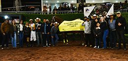 The winning connections of Manny Sr accept the Mexico Breeders’ Futurity Consolation trophy at the Hipodromo de las Americas on Sunday.