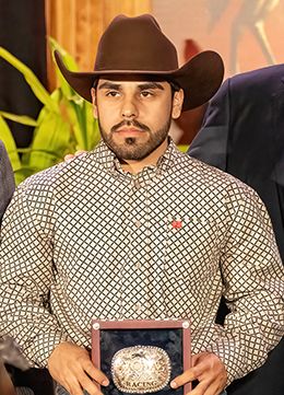 Luis Martinez receiving his 2025 AQHA Champion Jockey award.