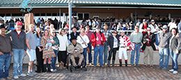 The winning connections of Rc Bigg Picture accept the Namehimastreaker New Mexico Classic Quarter Horse Championship stakes trophy at Zia Park.