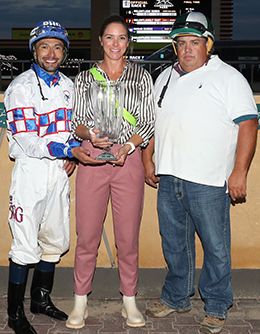The winning connections of Relentless Robin accept the $50,075 Canterbury Park Derby trophy Thursday.
