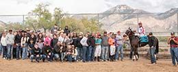 The winning connections of Paint Me Lp accept the Beehive Juvenile stakes trophy at Weber Downs.