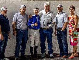 The winning connections of Jess Transcendent accept the Louisiana Juvenile Stakes trophy at Delta Downs Saturday.