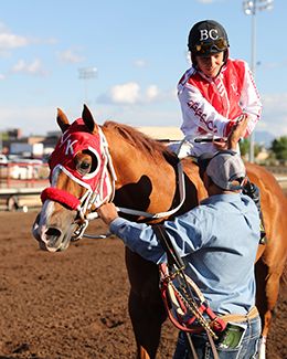 Jockey Bryan Candanosa celebrates after winning

the Grade 1 All American Derby aboard Dashing Tres.