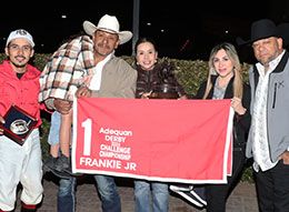 The winning connections of Frankie Jr accept the Adequan Derby Challenge Championship(G3) trophy at The Downs at Albuquerque on Saturday.