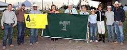 The connections of A Dream Fulfilled accept the All American Invitational winning trophy at the Downs at Albuquerque on Monday.