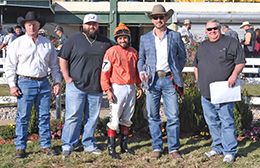The winning connections of Cowboy On The Fly accept the $42,030 Speedhorse Paint & Appaloosa Futurity Championship [G1] trophy at Will Rogers Downs on Tuesday.