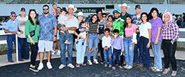The winning connections of Open Jessies Corona accept the $54,000 Jesse Yoakum Memorial 870 Stakes trophy at Sam Houston on Saturday.